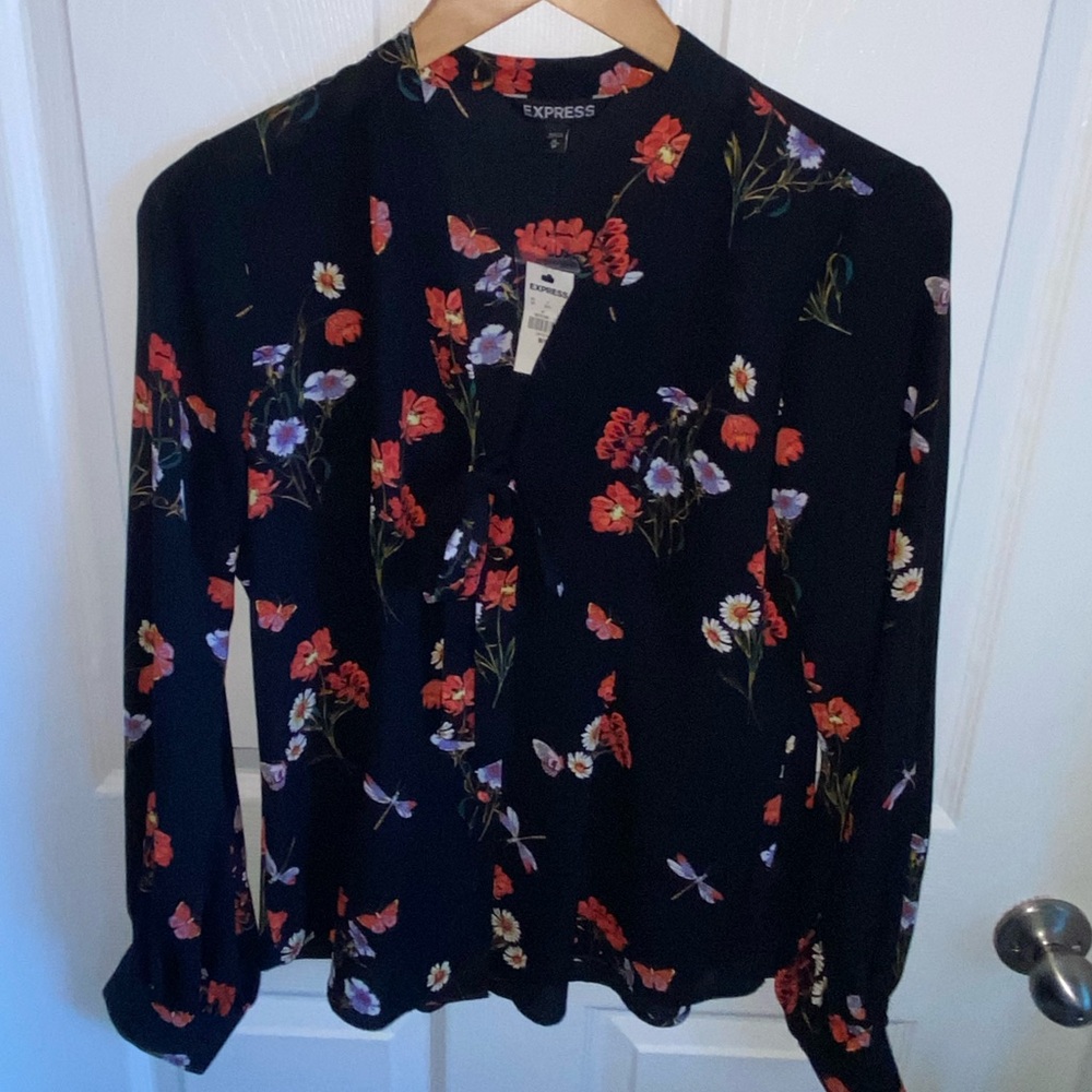 NWT Women’s Express Blouse with tie detail in black with multi colors in size M